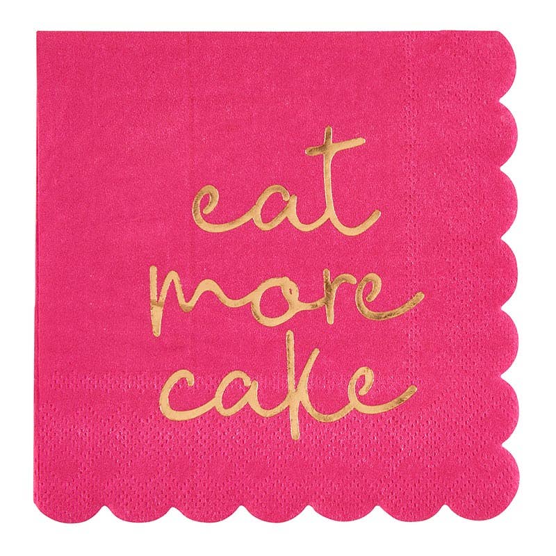 Pink napkin with gold 'eat more cake' text on a white background