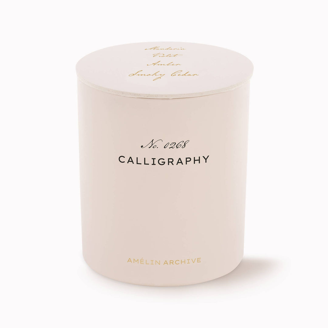 Candle with 'Calligraphy' text on a white background