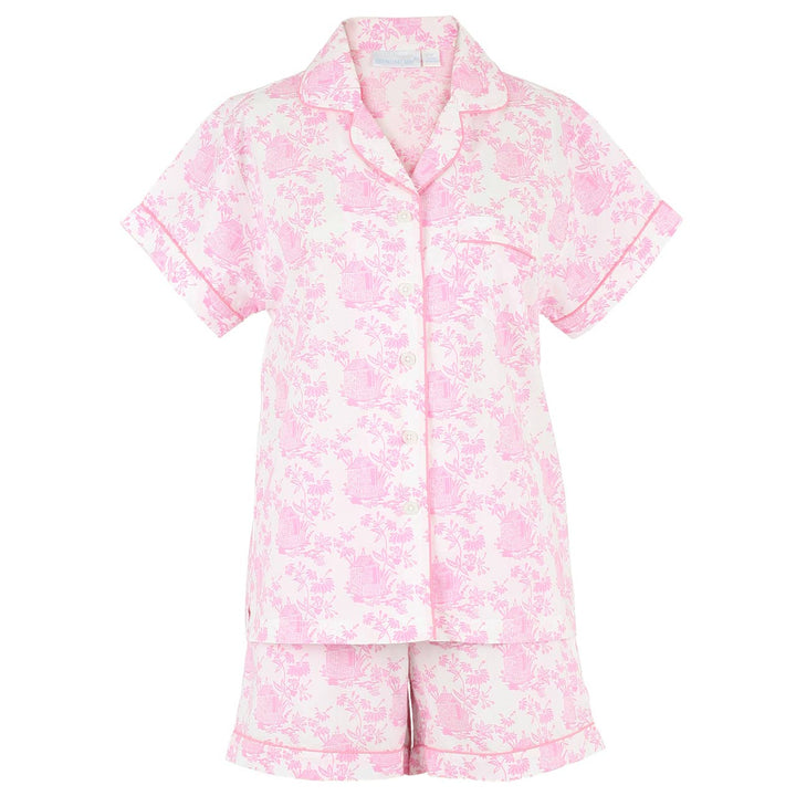 Pink floral pajama set on a white background