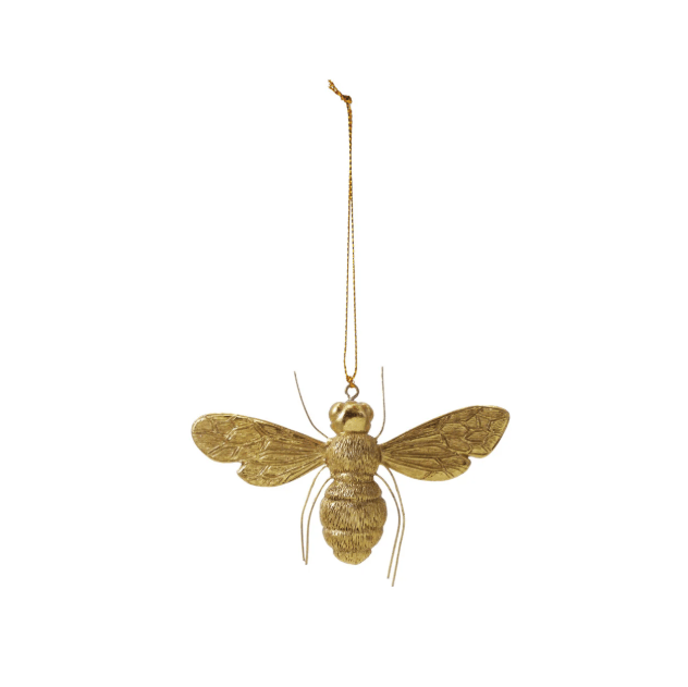 A metallic gold bumblebee hanging ornament with textured wings and a gold hanging string, shown against a plain white background.