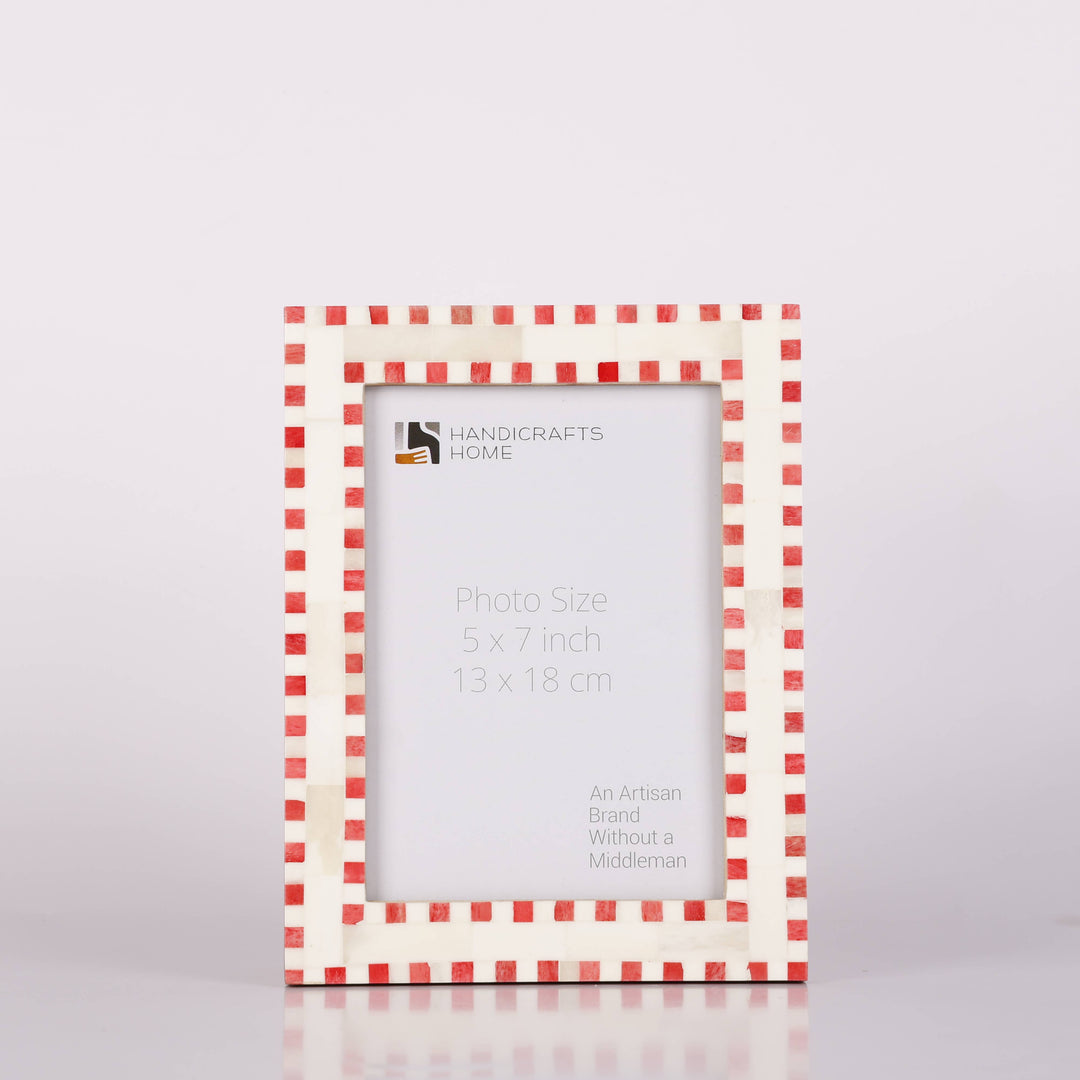 Red and white checkered photo frame on a light gray background