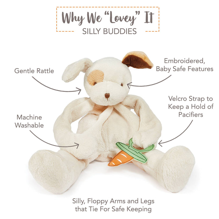 Plush dog lovey and pacifier holder with features highlighted on a white background