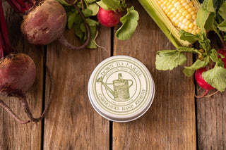 Gardener’s Hand Remedy Balm. It contains a veritable garden of the best herbal ingredients – like neem and manuka (to name a few), to penetrate and nourish with antibacterial and anti-fungal properties which help protect minor scrapes, along with shea and coconut oils for their superior moisturizing benefits to help make calloused gardeners’ hands soft and supple. 