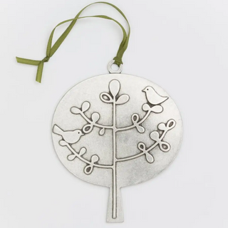 Celebrate the winter solstice with this handmade pewter ornament featuring two songbirds perched among detailed branches. Hand cast in lead free pewter. Comes in gift box. Three inches tall. Hand cast in our Rhode Island studio from lead-free pewter. 