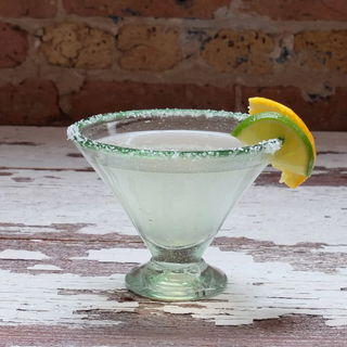 Celebrate good times with a margarita glass that is both delicate and bold, hand blown from recycled glass in Guatemala. 3.5"D x 5"H, 8 oz Dishwasher-safe     