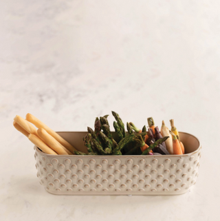 Instantly brighten and freshen any room with this window planter. Made out of stoneware, this piece features a unique white glaze finish perfect for matching any decor.