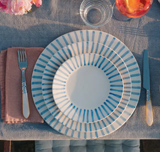 The Modello Collection from Vietri is inspired by the fashion trends lining the runways of Milan, and it brings sophistication and durability to everyday dining with a lively stripe design. Dinner plate, salad plate, pasta bowl, serving platter.