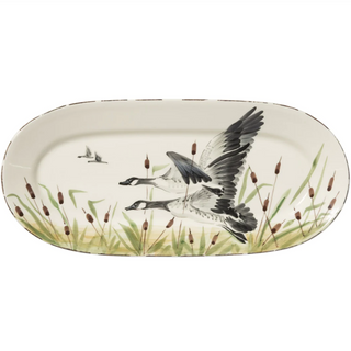 Handpainted in Tuscany, the Wildlife Geese Small Oval Platter brings the thrill of the hunt to your table. This whimsical collection combines a series of animals all representative of the grandeur of wildlife.