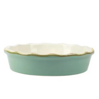 Featuring scalloped edges and a bright, beautiful hue, the Italian Bakers Pie Dish is part of VIETRI's newest line of bakeware. Handcrafted of Italian stoneware in Umbria, this unique size and fun shape is perfect for all gatherings.  9"D, 2"H, 1 Quart